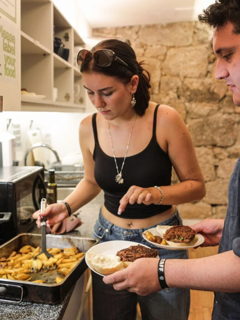 Hostel activities family dinner Onefam Hostels